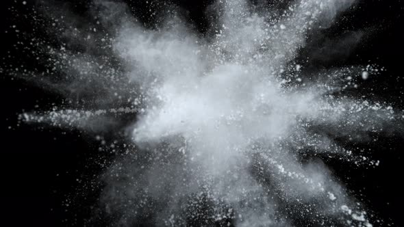 Super Slowmotion Shot of Color Powder Explosion Isolated on Black Background alt