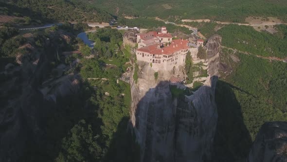 Drone view of Varlaam Monastery and Meteora rocks in Greece alt