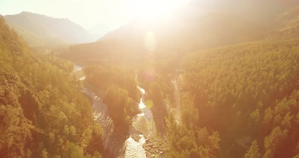 Low Altitude Flight Over Fresh Fast Mountain River with Rocks at Sunny Summer Morning alt