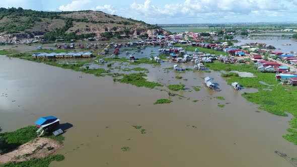 Farming and fishing village near Siem Reap in Cambodia seen from the sky alt