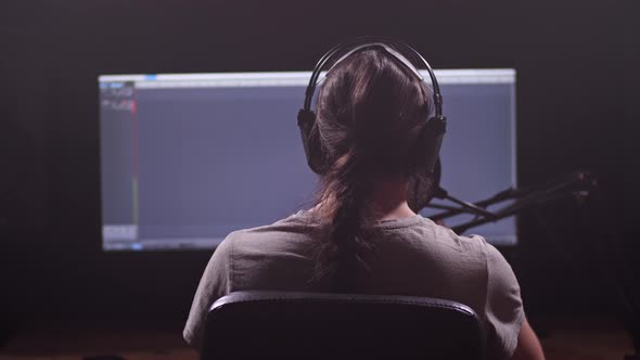 The Announcer Reads the Voice Into the Microphone alt