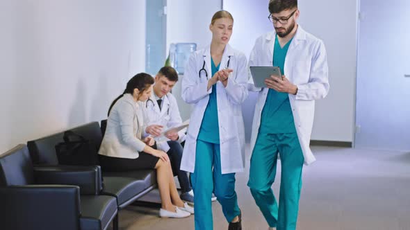 Multiethnic Female and Man Doctors in the Modern