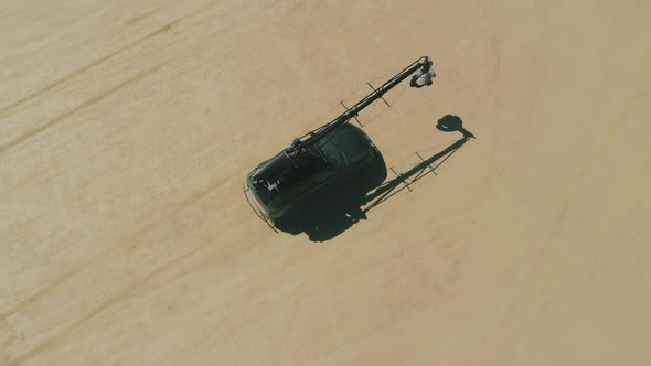 Overhead Aerial Black SUV Vehicle with Professional Cinematography Camera Crane alt