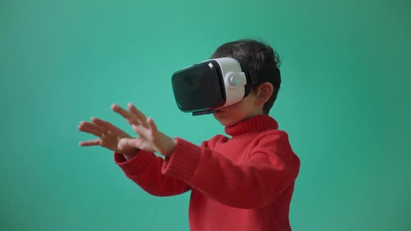 Excited Little Kid Using Virtual Reality Glasses