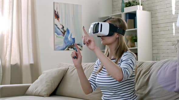 Woman in VR Headset Working alt