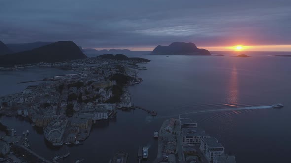 Alesund Town In Norway at Colorful Sunset with Cloudy Sky. Aerial View alt