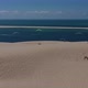 Paragliders Fly Over the Dune of Pilat Dune Du Pilat  Arcachon France - VideoHive Item for Sale