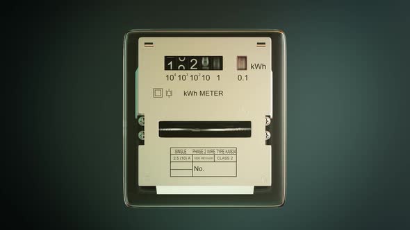 Analog electricity meter showing household consumption in kilowatt hours. alt