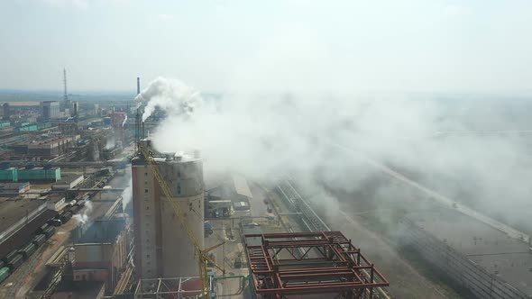 Aerial View, the Territory of the Plant, Smoke Comes Out of the Pipes, Large Pipes of the Plant