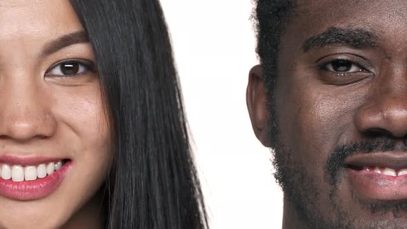 Halfface Portrait of Two Multiracial Diverse People Africanamerican Bearded Man and Asian Woman