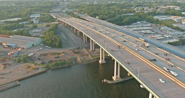 Aerial Top View of Huge Complex Road Junction at Cars Driving on the Alfred E alt