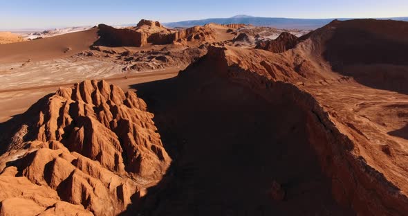 Aerial Drone Footage Over the Ridge of a Sandy Hill in the Most Arid Atacama Desert. alt