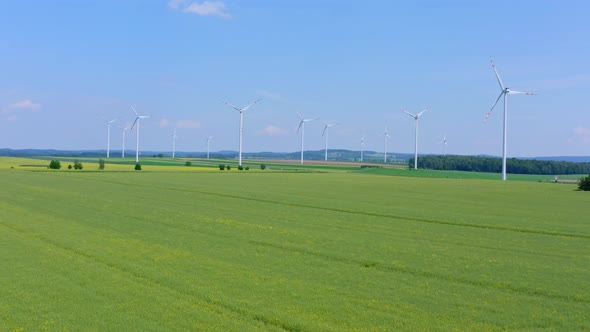 Wind Turbines On A Green FIeld