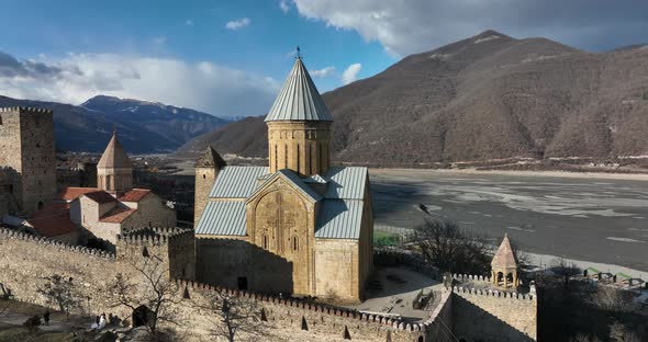 Aerial view of old Ananuri Fortress with two churches and picturesque view on river. Georgia 2022 alt