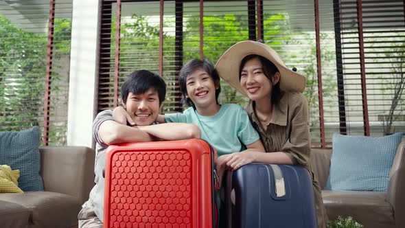 Portrait Asian family with luggage vacation concept.