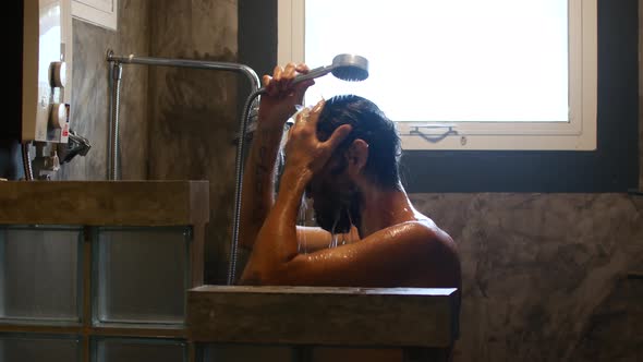 A Man Takes a Shower