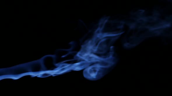 Blue Smoke on Black Background alt