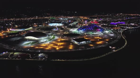 Aerial View of the Beautiful Night City. Olympic Park in Sochi at Night