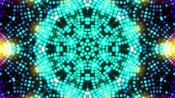 A bright disco ball with multicolored reflections on the wall alt