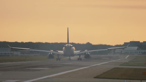 Airplane Landing at the Early Morning