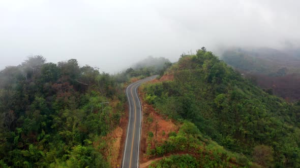 Aerial View of Curvy Road Number 3 in the Mountain of Pua District Nan Province Thailand alt