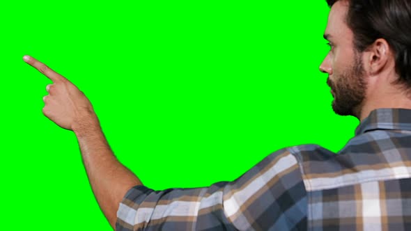 Man pretending to touch digital screen alt