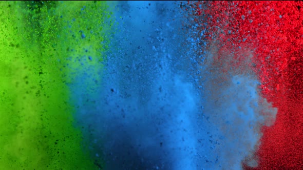 Super Slowmotion Shot of Color Powder Explosion Isolated on Black Background alt