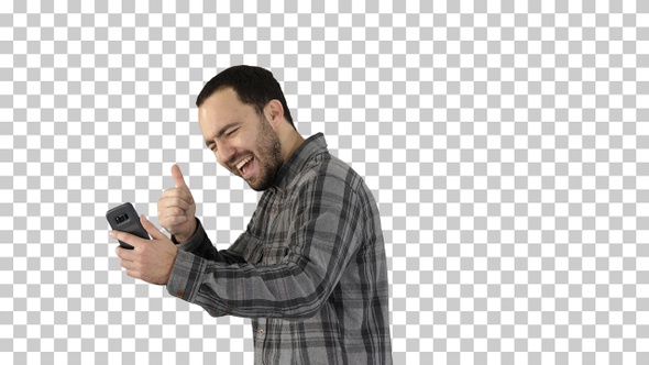 Portrait of successful handsome young man video chating alt