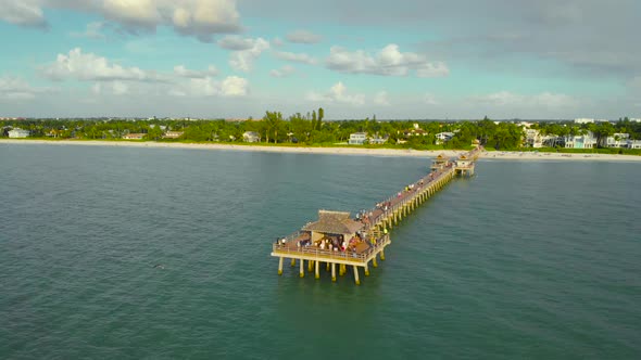 People Walk on a Pier in Naples, Florida, 