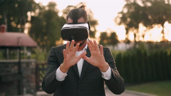 Succesful Bearded Businessman with Virtual Reality Headset Outdoor alt