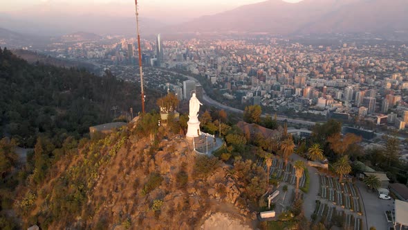 Aerial pan left of statue in Sanctuary of the Immaculate Conception in San Cristobal Hill summit, Sa alt