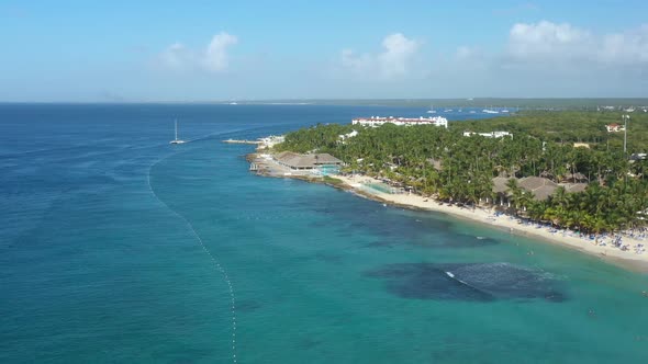 Dominicus Beach at Bayahibe with Caribbean Sea Sandy Seashore Lighthouse and Pier alt