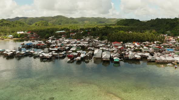 Fishing Village and Houses on Stilts. Dapa City, Siargao, Philippines alt