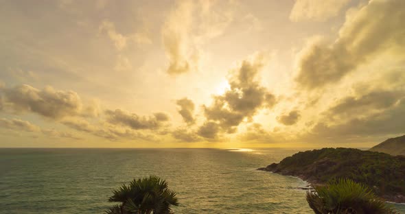 Time lapse sunset in the clouds alt