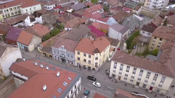 Aerial Drone Shot over a Charming Romanian City Full of Old World Architecture. alt
