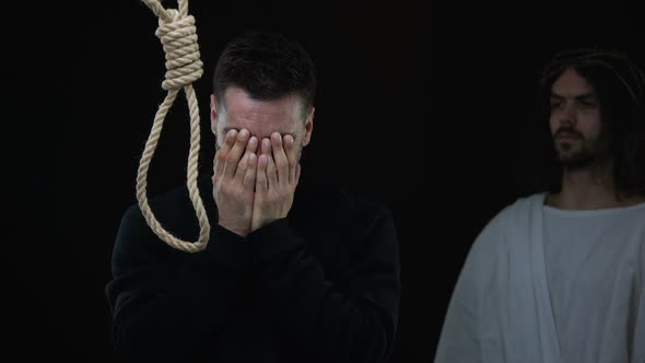 Holy Savior Uncovering Sad Male Eyes Standing Near Rope Loop, Faith in God alt