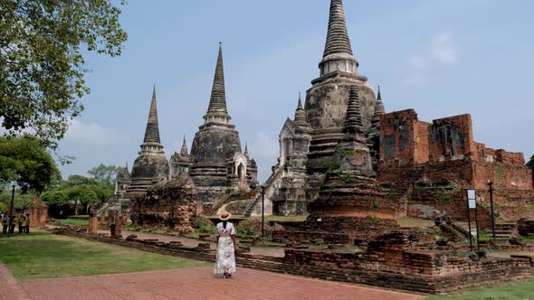 Ayutthaya Thailand at Wat Phra Si Sanphet Women with a Hat and Tourist Map Visiting Ayyuthaya alt