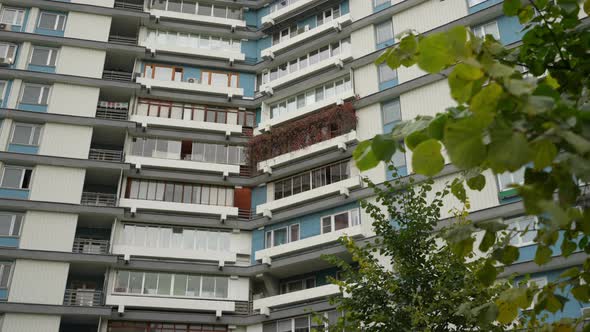 The Facade of a Highrise Residential Building with Unusual Balconies