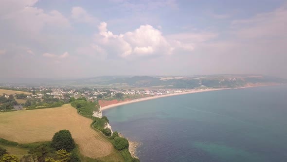 Beautiful wide, aerial view of British coastline. Beer, UK. Tourism, Travel. alt