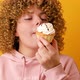 Close Up Portrait of a Hungry 30s Woman Biting Cream Cake - VideoHive Item for Sale