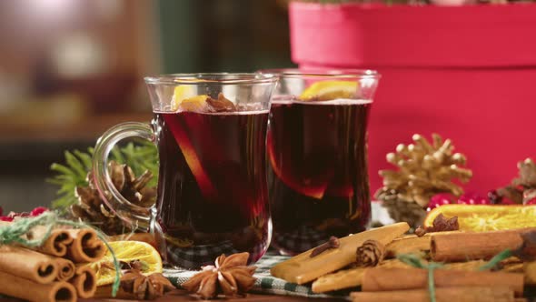 Hot Wine in Glass Mugs Gluhwein and Cinnamon Closeup alt