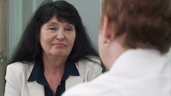 Therapeutic Taking Care of Her Client in Hospital Room alt