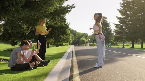 Group of Hipsters Teenagers Having Fun in Park on Road Teenage Girl Dancing Street Dance alt