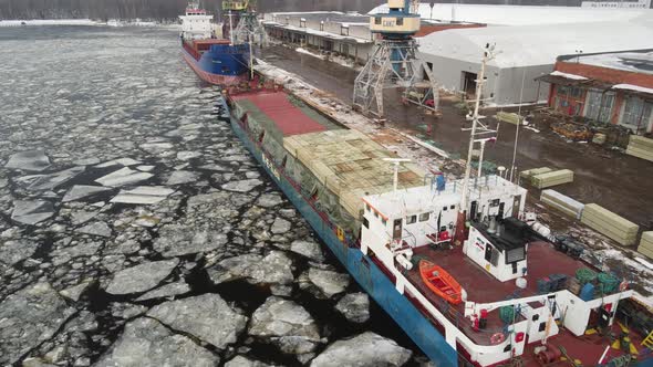 Cargo ship in port alt