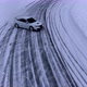 Aerial view of the rally car on a snowy road - VideoHive Item for Sale