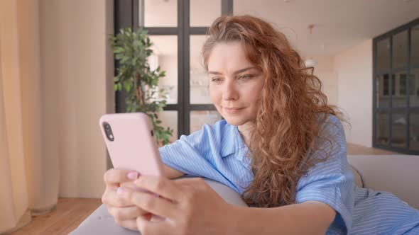 Adult Woman with Mobile Phone Texting Message