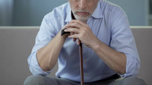 Aged Man Sitting on Sofa and Coughing, Complications of Pneumonia, Health alt