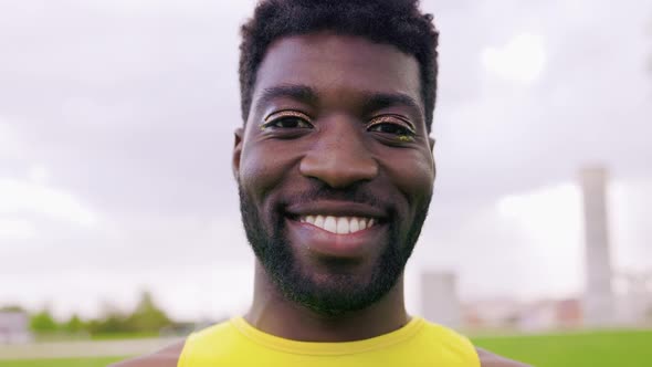Gay African Man Wearing Make Up Wearing Makeup Looking at Camera Outdoor Queer and LGBT Community alt