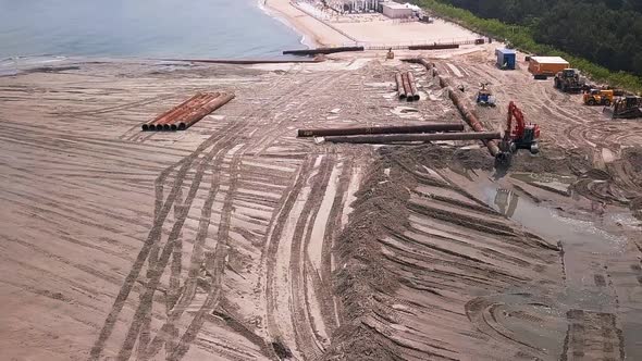 how does beach dredging work