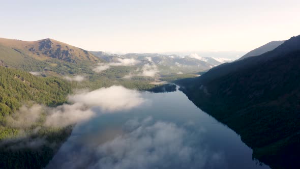 Aerial View at Multinskoe Lake in the Altai Mountains in Clouds